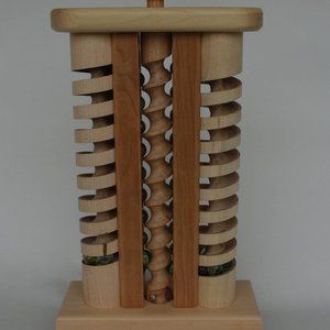 Wooden toys with marbles.